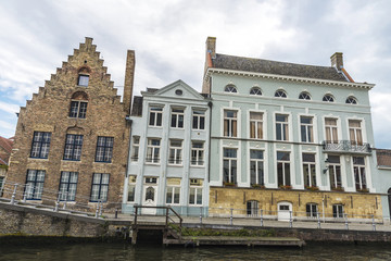 Fototapeta na wymiar Old houses along the river in Bruges, Belgium