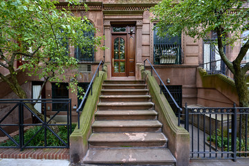 steps leading up to a brownstone building