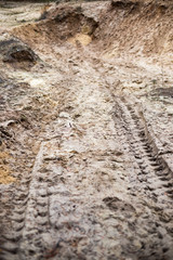 Tire tracks on the sand road