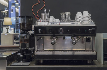 Professional coffee machine making close up in restaurant