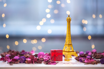 Eiffel tower souvenir with purple herbs