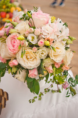 A bouquet of Big and small roses on the table 318.