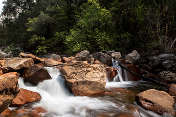 Long Exposure of Rushing River Water Over Rocks 03