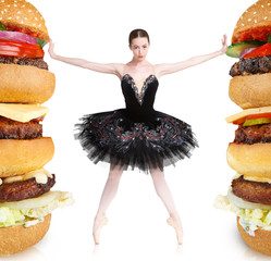 Slim balerina rejecting big burgers to stay fit © Prostock-studio