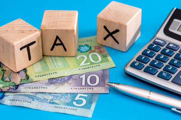 Wooden cubes tax with canadian dollar