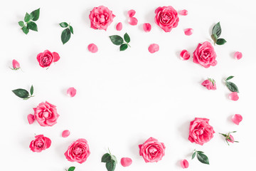 Flowers composition. Frame made of pink rose flowers on white background. Flat lay, top view, copy...