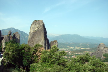 panorama of the rocks of St. Meteors in the background of mountain ranges on the horizon.