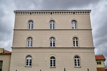 Naklejka premium Facade of a classicist tenement house in the city of Gniezno.