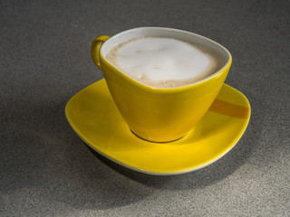 cappuccino on grey table