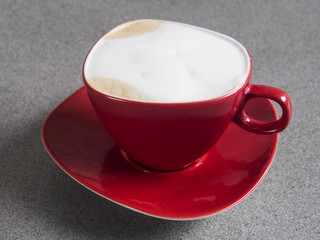 cappuccino on grey table