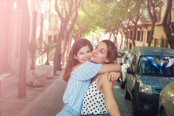 two cheerful beautiful girls