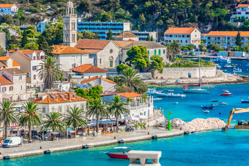 Hvar coastal town above. / Aerial view at coastal town Hvar in Southern Croatia, popular travel resort in Mediterranean, Europe.