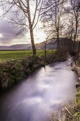 Sonnenuntergang am Bach