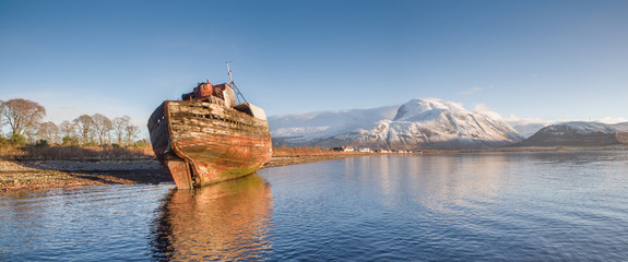 landscape view of scotland and ben nevis near fort william in winter with snow capped mountains and...