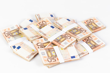 Pile of fifty euro banknotes