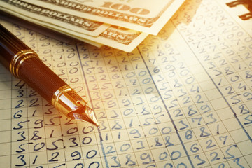 Accounting book for calculating cost and money. Budgeting concept.