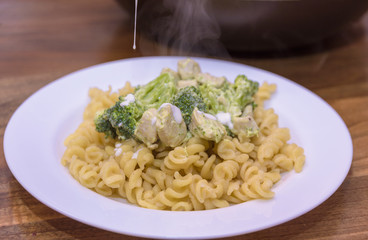 Macaroni with broccoli and chicken breast
