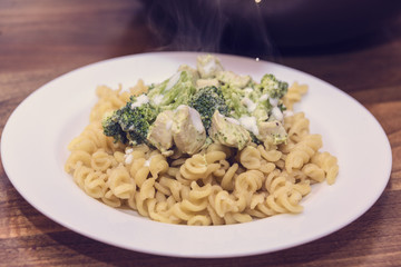 Macaroni with broccoli and chicken breast