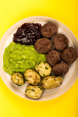 Norwegian or Sweedish Meatballs With Mushy Peas Boiled Potatoes and Cranberry Sauce