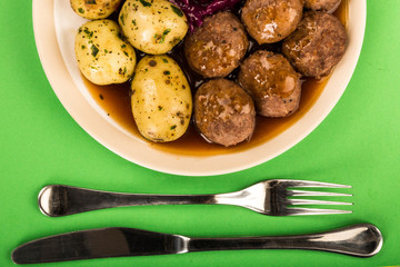 Swedish or Norwegian Meatballs With Boiled Potatoes  Red Cabbage and Gravy Meal