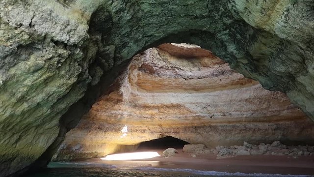 Entering beautiful Benagil cave by boat - Algarve in Portugal