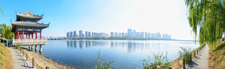 Shenyang City in the morning. Located in Shenshuiwan Park, Shenyang City, Liaoning province, China. - obrazy, fototapety, plakaty