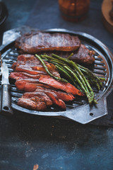 Grilled ginger-marinated flank steak with asparagus grilled diet food concept