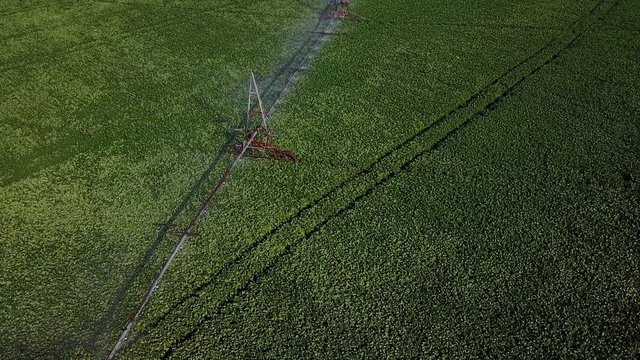 Irrigation system on the field. Video about agriculture