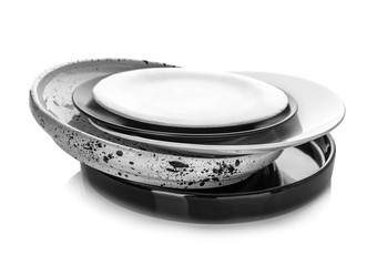 Ceramic plates on white background