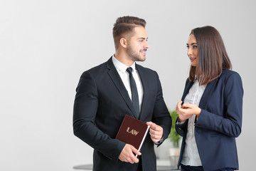 Young team of lawyers at workplace
