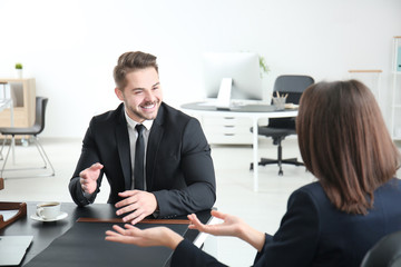 Young team of lawyers at workplace