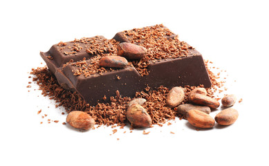 Piece of chocolate and cocoa beans on white background