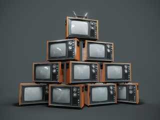Pile of old retro TVs on dark background - obrazy, fototapety, plakaty