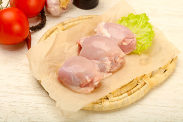 Boneless raw chicken thighs