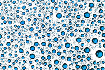 Blue water drops pattern isolated on white background.