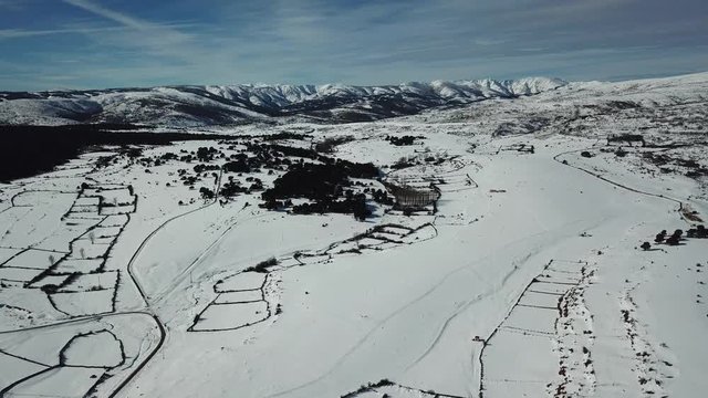 Aerial view of a small village after a heavy snowfall in Guadalajara