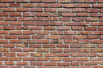 Old beige brick wall background texture