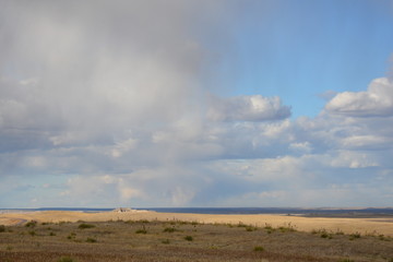 Clouds dropping down to the range in the Badlands