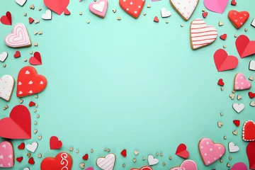 Poster Im Rahmen Homemade valentine cookies on mint background © 5second