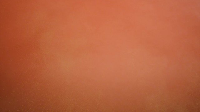 Colorful powder/particles fly after being throwed