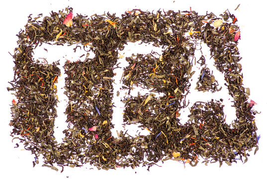 Tea leaf with flowers and fruit word tea on white background