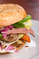 Duck meat bagel.