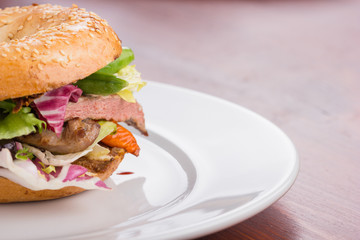 Duck meat bagel.