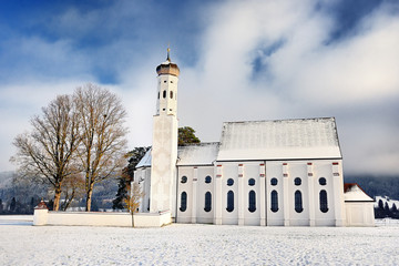 Beautiful St. Coloman pilgrimage church, Bavaria, Germany in snowy winter day - obrazy, fototapety, plakaty