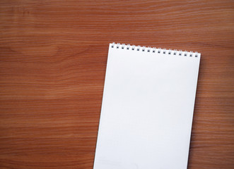 notebook on a wooden background