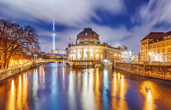Germany, Berlin. Island of museums on Spree river and Alexanderplatz TV tower in center of Berlin, Deutschland. Night twilight scenery.