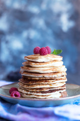 Pancakes with berries and honey. Copy space