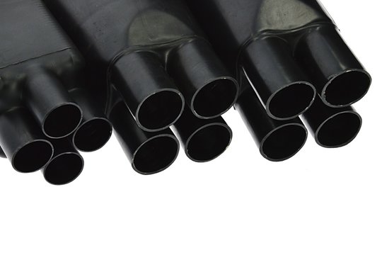 Funnel looking black rubber shrinkable cable breakout boots of various diameters, white background