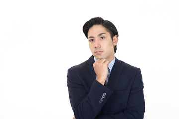 不安そうな表情のビジネスマン