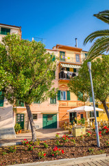 Fototapeta premium Narrow streets and traditional buildings of Celle Ligure, Liguria, Italy
